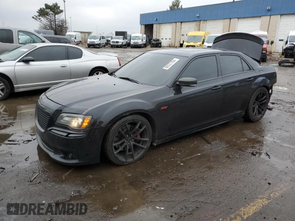 2012 Chrysler 300 SRT8 with VIN 2C3CCAFJ0CH801090, listed as a Copart auction lot 86537394 with 126,439 mi miles and Clean Title. Bid and sale history available at carsss.com. Image 1.