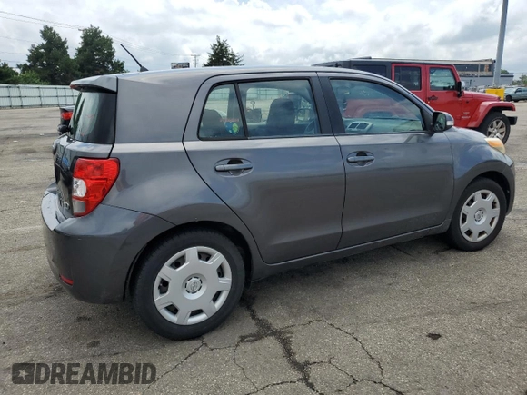 2011 Scion xD with VIN JTKKU4B41B1014726, listed as a Copart auction lot 65149405 with 210,102 mi miles and Salvage title. Bid and sale history available at DreamBid. Image 3.