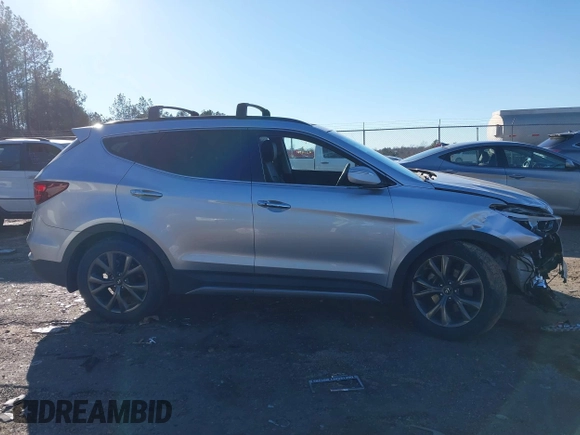 2018 Hyundai Santa Fe Ultimate with VIN 5XYZW4LAXJG554420, listed as a IAAI auction lot 41628371 with 65,436 mi miles and . Bid and sale history available at DreamBid. Image 13.