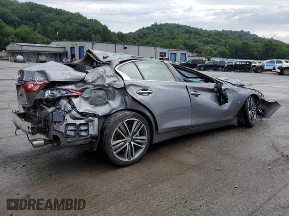 2015 Infiniti Q50 Premium с VIN JN1BV7AR4FM409526, выставлен на аукционе Copart как лот 64749215 с пробегом 82 952 миль миль и Списание • Salvage title. История ставок и продаж доступна на DreamBid. Изображение 3.