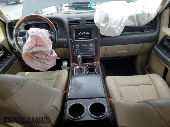 2015 Lincoln Navigator with VIN 5LMJJ2HT4FEJ14227, listed as a Copart auction lot 45225485 with 84,733 mi miles and Salvage title. Bid and sale history available at DreamBid. Image 8.