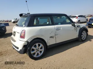 2009 MINI Hardtop S with VIN WMWMF73529TW81190, listed as a Copart auction lot 54172195 with 83,841 mi miles and Salvage Title. Bid and sale history available at DreamBid. Image 3.