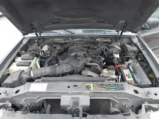 2005 Ford Explorer Sport Trac XLS z VIN 1FMZU77K05UB13891, wystawiony jako IAAI lot #40859877 z przebiegiem 157 308 mil mil oraz . Historia ofert i sprzedaży dostępna na DreamBid. Obrazek 10.