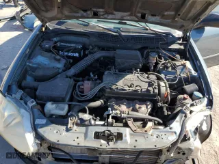 1999 Honda Civic DX with VIN 1HGEJ6629XL031952, listed as a Copart auction lot 41691105 with 66,909 mi miles and Salvage Title. Bid and sale history available at carsss.com. Image 13.