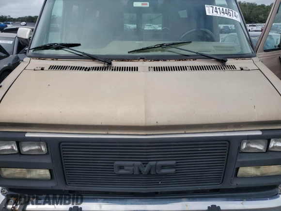 1995 GMC Rally z VIN 1GJGG39K6SF525508, wystawiony jako Copart lot #74144674 z przebiegiem Nie podano mil oraz Szkody całkowita. Historia ofert i sprzedaży dostępna na DreamBid. Obrazek 12.