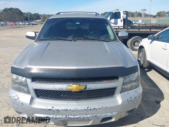 2013 Chevrolet Tahoe LS with VIN 1GNSCAE00DR361459, listed as a IAAI auction lot 41614458 with 171,925 mi miles and . Bid and sale history available at DreamBid. Image 12.