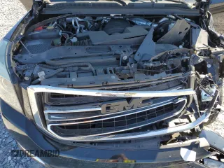 2015 GMC Yukon SLT z VIN 1GKS1BKC2FR244797, wystawiony jako Copart lot #49465995 z przebiegiem 242 448 mil mil oraz Szkoda całkowita • Salvage title. Historia ofert i sprzedaży dostępna na DreamBid. Obrazek 14.