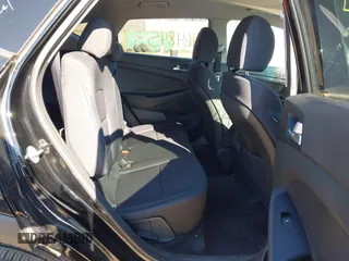 2019 Hyundai Tucson SE with VIN KM8J2CA46KU073107, listed as a IAAI auction lot 41648453 with 58,417 mi miles. Bid and sale history available at carsss.com. Image 8.