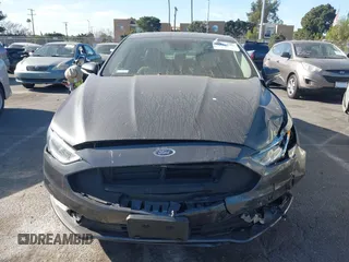 2017 Ford Fusion Titanium z VIN 3FA6P0SU5HR105477, wystawiony jako IAAI lot #41072696 z przebiegiem 92 926 mil mil oraz . Historia ofert i sprzedaży dostępna na DreamBid. Obrazek 12.
