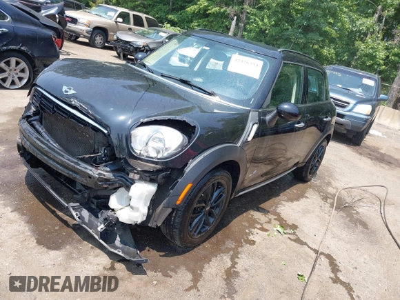 2015 MINI Countryman S with VIN WMWZC5C56FWP45115, listed as a IAAI auction lot 42426394 with 52,937 mi miles and . Bid and sale history available at DreamBid. Image 18.
