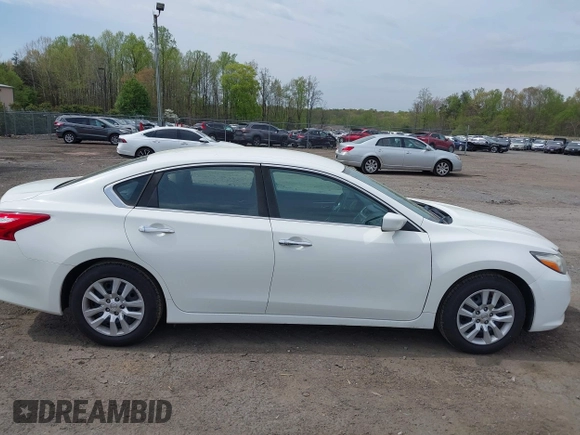 2016 Nissan Altima SV with VIN 1N4AL3APXGC211102, listed as a IAAI auction lot 41998063 with 149,760 mi miles and . Bid and sale history available at DreamBid. Image 13.