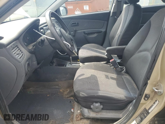 2011 Kia Rio with VIN KNADH4B30B6712241, listed as a Copart auction lot 61301184 with 159,902 mi miles and Salvage Title. Bid and sale history available at DreamBid. Image 7.