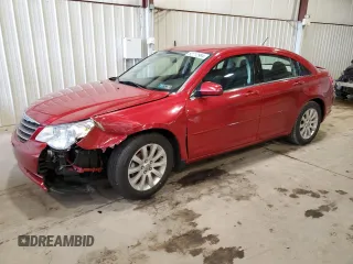 2010 Chrysler Sebring Limited with VIN 1C3CC5FB5AN146719, listed as a Copart auction lot 82712994 with 52,774 mi miles and Salvage Title. Bid and sale history available at carsss.com. Image 1.