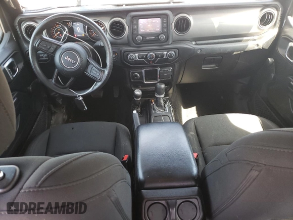 2021 Jeep Gladiator Freedom с VIN 1C6HJTAG4ML580023, выставлен на аукционе Copart как лот 57586475 с пробегом 64 022 миль миль и Списание • Salvage title. История ставок и продаж доступна на DreamBid. Изображение 8.