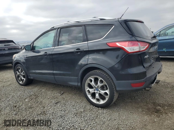 2014 Ford Escape Titanium with VIN 1FMCU9J90EUC89590, listed as a Copart auction lot 43985065 with 128,878 mi miles and Salvage Title. Bid and sale history available at carsss.com. Image 2.