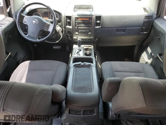 2012 Nissan Titan SV with VIN 1N6BA0ED1CN323589, listed as a Copart auction lot 62068904 with 148,354 mi miles and Salvage Title. Bid and sale history available at DreamBid. Image 8.
