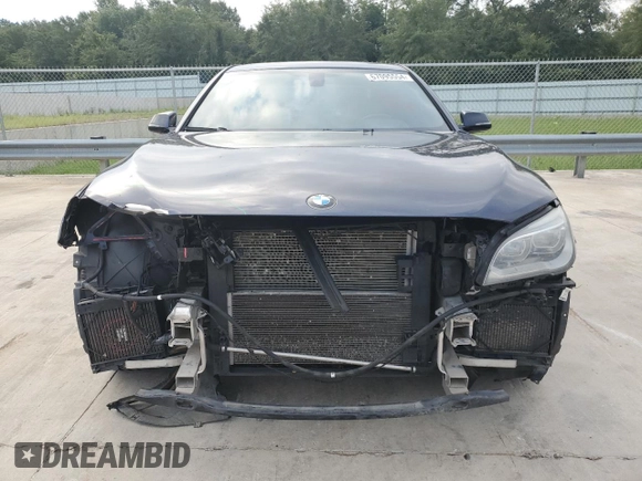 2015 BMW 7 Series 750i z VIN WBAYA8C51FG197764, wystawiony jako Copart lot #67095554 z przebiegiem 167 458 mil mil oraz Szkoda całkowita • Salvage title. Historia ofert i sprzedaży dostępna na DreamBid. Obrazek 5.