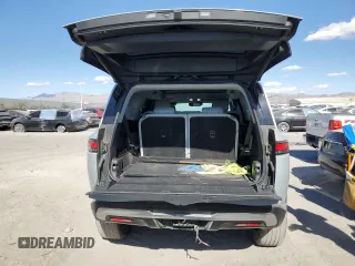 2023 Rivian R1S Adventure z VIN 7PDSGABA1PN021963, wystawiony jako Copart lot #43451105 z przebiegiem 165 mil mil oraz Szkody całkowita. Historia ofert i sprzedaży dostępna na DreamBid. Obrazek 6.