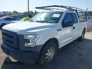 2015 Ford F-150 XL with VIN 1FTEX1C89FFC78555, listed as a IAAI auction lot 41989102 with 216,655 mi miles. Bid and sale history available at carsss.com. Image 2.