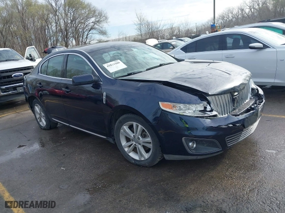 2009 Lincoln MKS with VIN 1LNHM93R39G619004, listed as a IAAI auction lot 41834480 with 184,817 mi miles. Bid and sale history available at carsss.com. Image 1.