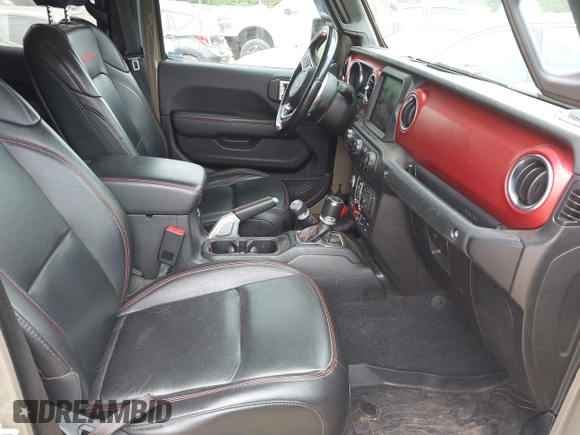 2020 Jeep Gladiator Rubicon z VIN 1C6JJTBG6LL179541, wystawiony jako IAAI lot #42050510 z przebiegiem 52 784 mil mil oraz . Historia ofert i sprzedaży dostępna na DreamBid. Obrazek 5.