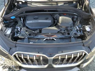 2025 BMW X1 xDrive28i with VIN WBX73EF00S5111795, listed as a Copart auction lot 48765255 with 12,042 mi miles and Salvage Title. Bid and sale history available at carsss.com. Image 12.