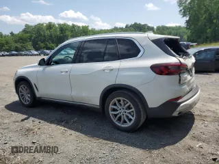 2023 BMW X5 xDrive40i with VIN 5UXCR6C03P9P75351, listed as a Copart auction lot 61465655 with 24,883 mi miles and Salvage title. Bid and sale history available at DreamBid. Image 2.