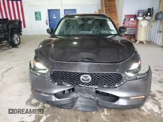 2023 Mazda CX-30 S Carbon Edition z VIN 3MVDMBCM5PM569903, wystawiony jako Copart lot #84850594 z przebiegiem 14 653 mil mil oraz Szkoda całkowita • Salvage title. Historia ofert i sprzedaży dostępna na DreamBid. Obrazek 5.