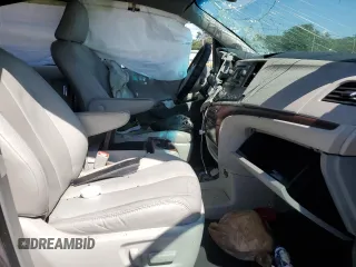 2012 Toyota Sienna XLE AAS with VIN 5TDYK3DC4CS197176, listed as a Copart auction lot 57942845 with Not provided miles and Salvage title. Bid and sale history available at DreamBid. Image 7.