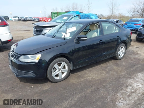 2012 Volkswagen Jetta Sedan TDI w/Premium & Nav with VIN 3VWLL7AJXCM026589, listed as a IAAI auction lot 41870945 with 72,544 mi miles. Bid and sale history available at carsss.com. Image 2.