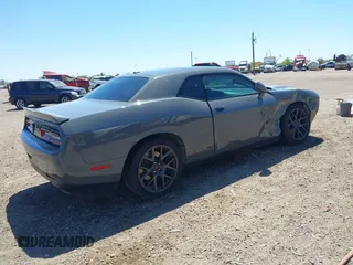 2018 Dodge Challenger R/T with VIN 2C3CDZBT2JH146463, listed as a IAAI auction lot 41973692 with 49,913 mi miles and . Bid and sale history available at DreamBid. Image 4.
