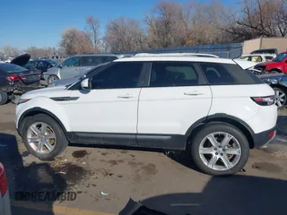 2014 Land Rover Range Rover Evoque Pure Plus z VIN SALVP2BG7EH866285, wystawiony jako IAAI lot #41412019 z przebiegiem 127 636 mil mil oraz . Historia ofert i sprzedaży dostępna na DreamBid. Obrazek 14.