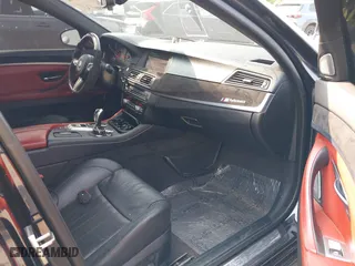 2013 BMW M5 with VIN WBSFV9C56DC772507, listed as a IAAI auction lot 40109662 with 127,881 mi miles. Bid and sale history available at carsss.com. Image 5.