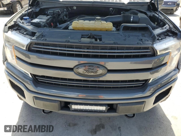 2018 Ford F-150 XL with VIN 1FTEW1EG6JFD93727, listed as a Copart auction lot 65403215 with 187,340 mi miles and Clean title. Bid and sale history available at DreamBid. Image 11.
