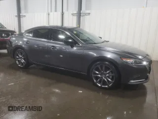2021 Mazda 6 Signature with VIN JM1GL1XY5M1605378, listed as a Copart auction lot 42727233 with 39,448 mi miles and . Bid and sale history available at DreamBid. Image 4.