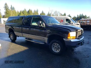 1999 Ford F-350 XL z VIN 1FTSX31F0XEC31633, wystawiony jako Copart lot #84082754 z przebiegiem 192 085 mil mil oraz Szkoda całkowita • Salvage title. Historia ofert i sprzedaży dostępna na DreamBid. Obrazek 4.
