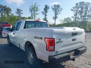 2016 Ford F-150 XLT with VIN 1FTEX1E89GFA95834, listed as a IAAI auction lot 41986995 with 153,202 mi miles. Bid and sale history available at carsss.com. Image 14.