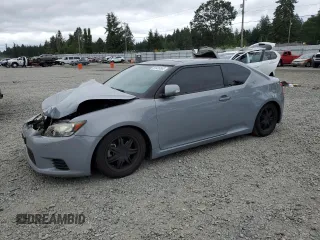 2011 Scion tC z VIN JTKJF5C70B3000342, wystawiony jako Copart lot #59426565 z przebiegiem 149 915 mil mil oraz Szkoda całkowita • Salvage title. Historia ofert i sprzedaży dostępna na DreamBid. Obrazek 1.