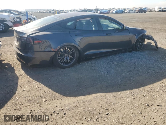 2024 Tesla Model S z VIN 5YJSA1E57RF545269, wystawiony jako Copart lot #87419784 z przebiegiem Nie podano mil oraz Szkoda całkowita • Salvage title. Historia ofert i sprzedaży dostępna na DreamBid. Obrazek 3.
