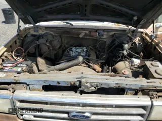 1987 Ford F-150 с VIN 1FTEF14H2HKB06296, выставлен на аукционе Copart как лот 57914035 с пробегом 40 931 миль миль и Чистый • Clean title. История ставок и продаж доступна на DreamBid. Изображение 11.