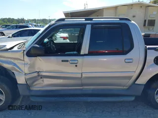 2004 Ford Explorer Sport Trac XLS z VIN 1FMZU67K34UA66302, wystawiony jako IAAI lot #42203931 z przebiegiem 221 245 mil mil oraz . Historia ofert i sprzedaży dostępna na DreamBid. Obrazek 14.