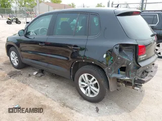 2013 Volkswagen Tiguan S with VIN WVGAV3AX2DW594334, listed as a IAAI auction lot 42405989 with 96,559 mi miles and . Bid and sale history available at DreamBid. Image 3.