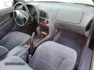 1997 Chrysler Sebring with VIN 4C3AU42N6VE180381, listed as a Copart auction lot 79449954 with 126,425 mi miles and Clean Title. Bid and sale history available at DreamBid. Image 8.