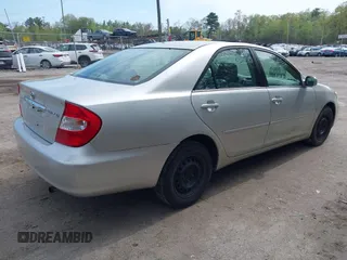 2002 Toyota Camry LE z VIN 4T1BE32K42U029129, wystawiony jako IAAI lot #42190162 z przebiegiem 191 423 mil mil oraz . Historia ofert i sprzedaży dostępna na DreamBid. Obrazek 4.