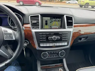 2014 Mercedes-Benz M 550 with VIN 4JGDA7DB5EA423124, listed as a Copart auction lot 53713385 with 215,650 mi miles and Clean Title. Bid and sale history available at carsss.com. Image 10.