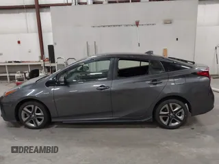 2020 Toyota Prius L Eco with VIN JTDKARFU1L3117299, listed as a IAAI auction lot 42544586 with 42,560 mi miles and . Bid and sale history available at DreamBid. Image 14.