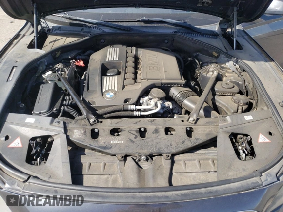 2012 BMW 7 Series 740i with VIN WBAKA4C54CC613419, listed as a Copart auction lot 54420885 with 104,006 mi miles and Salvage Title. Bid and sale history available at DreamBid. Image 11.