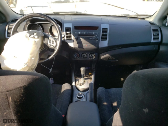 2009 Mitsubishi Outlander ES with VIN JA4LT21W69Z014832, listed as a Copart auction lot 59051554 with 165,242 mi miles and Salvage Title. Bid and sale history available at carsss.com. Image 8.