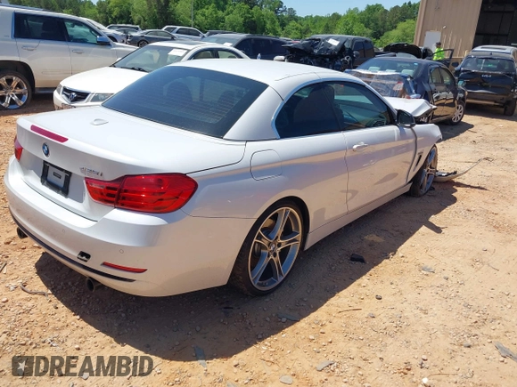 2014 BMW 4 Series 435i z VIN WBA3T3C5XEP737022, wystawiony jako IAAI lot #42135541 z przebiegiem 70 080 mil mil oraz . Historia ofert i sprzedaży dostępna na DreamBid. Obrazek 4.