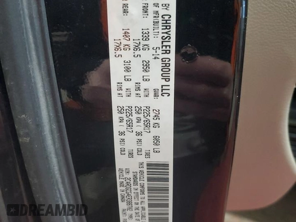 2014 Dodge Grand Caravan SXT with VIN 2C4RDGCG4ER388702, listed as a Copart auction lot 44722665 with 206,299 mi miles and Salvage Title. Bid and sale history available at DreamBid. Image 14.